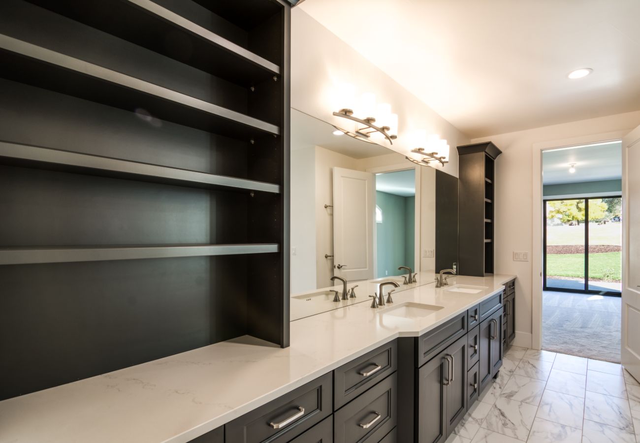 master bathroom with built in shelves